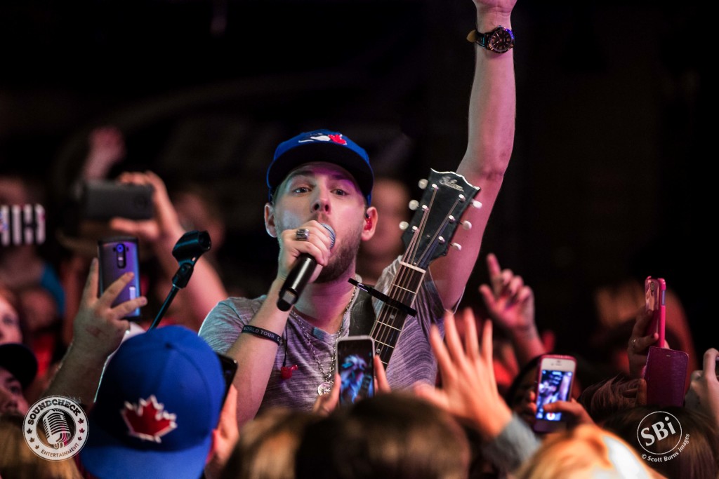 Brett gets into the crowd at The Roxy Theatre in Barrie on the Airwaves Tour: Photo Scott Burns 