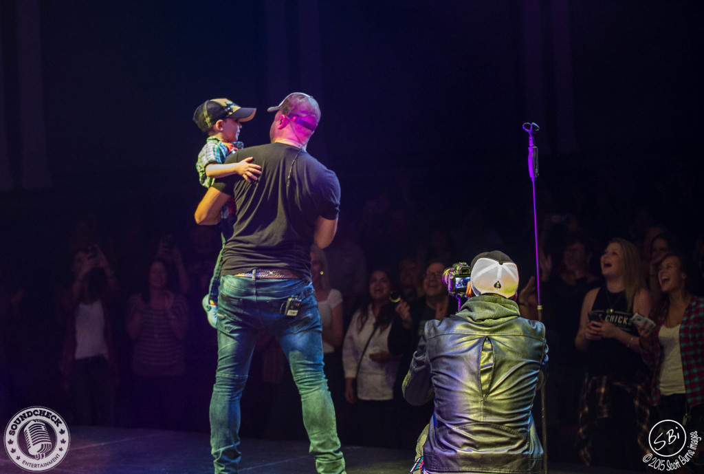 Tebey brings a little fan up on stage during his set in Oshawa at The Regent Theatre - Photo: Scott Burns Images