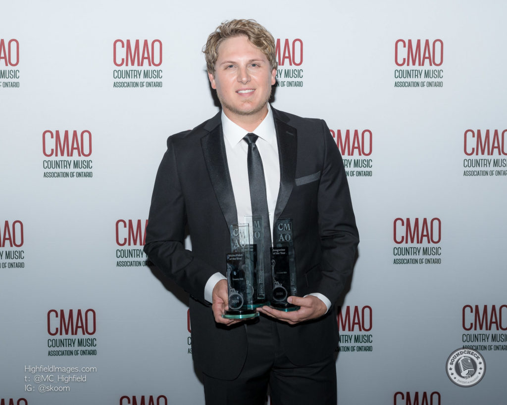 Jason Blaine wins Songwriter of the Year, Music Video of the Year and Male Artist of the Year - photo by Mike Highfield