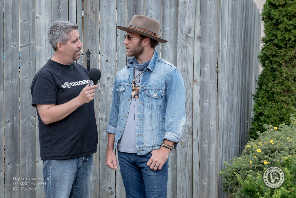 Corey chats with Drake White backstage at CMT Music Fest - Photo: Mike Highfield