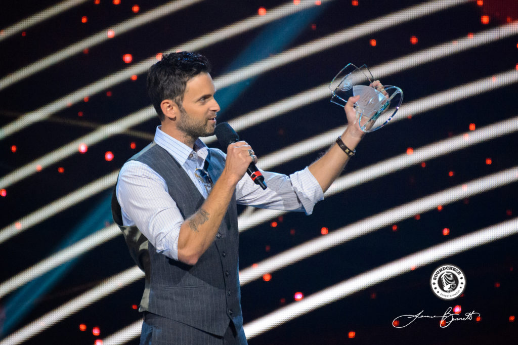 Dean Brody accepts one of his 4 CCMA Awards during the Show in London, ON - Photo: James Bennett