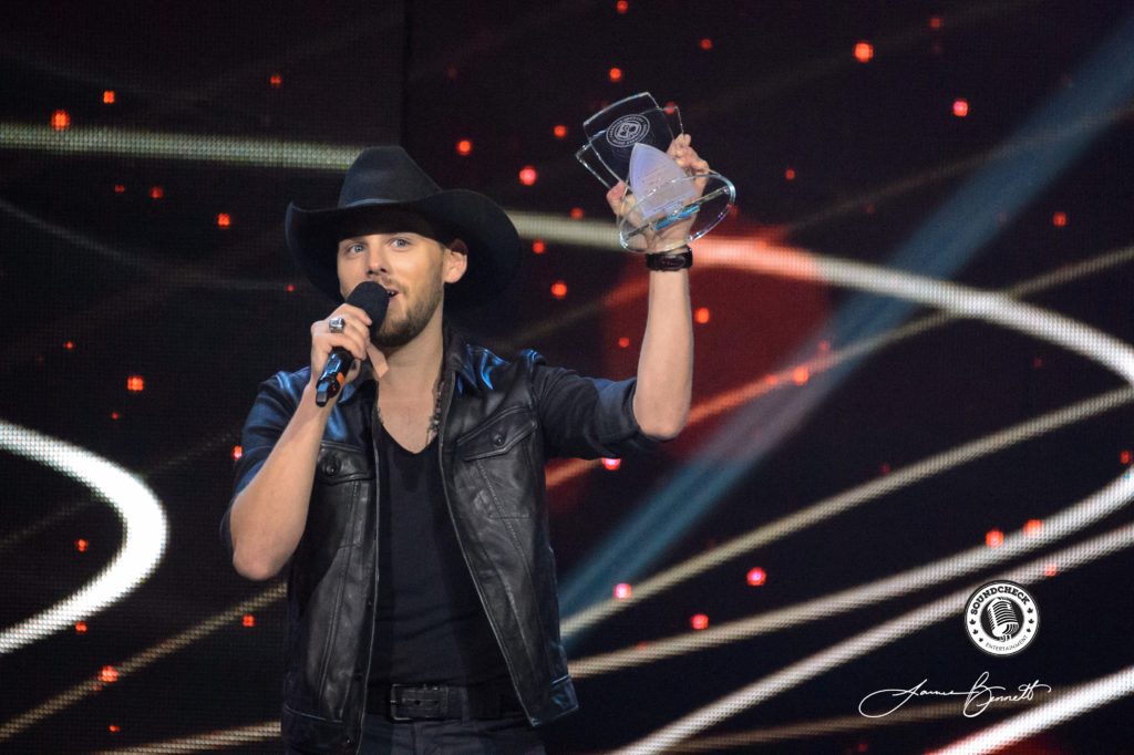 Brett Kissel accepts his CCMA Award during the broadcast from London, ON - Photo: James Bennett