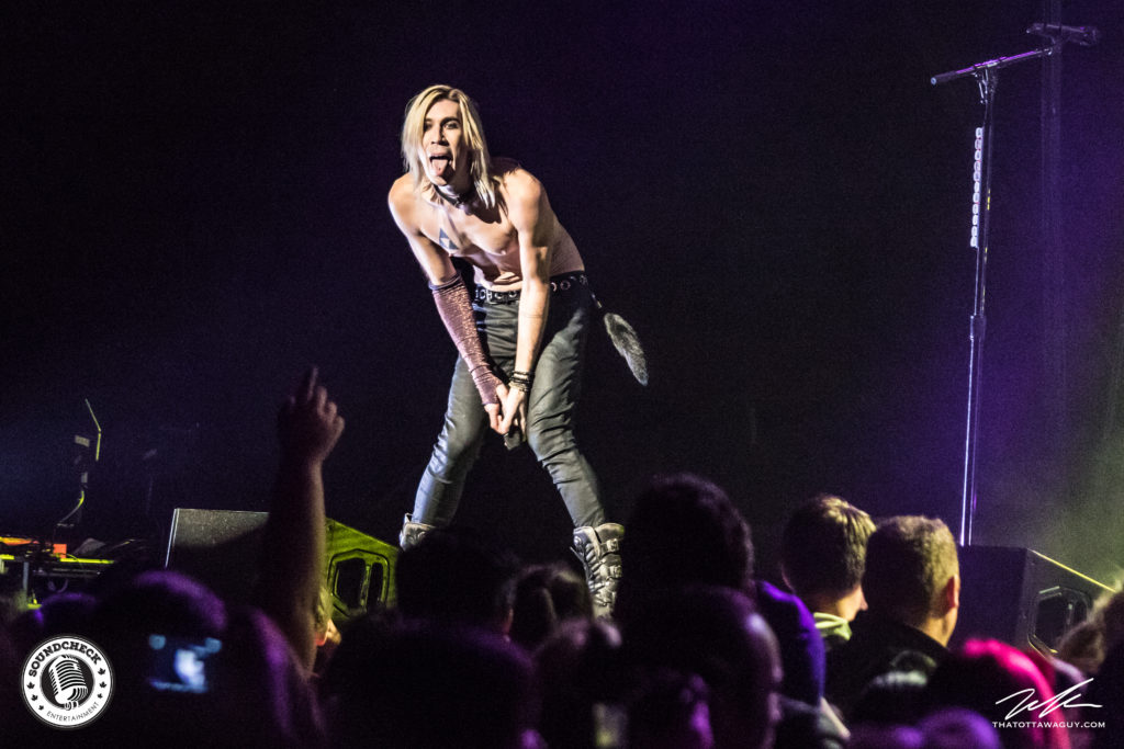 A shirtless Josh Ramsay of Marianas Trench performs in front of a capacity crowd at TD Place - photo by Marc Labreque