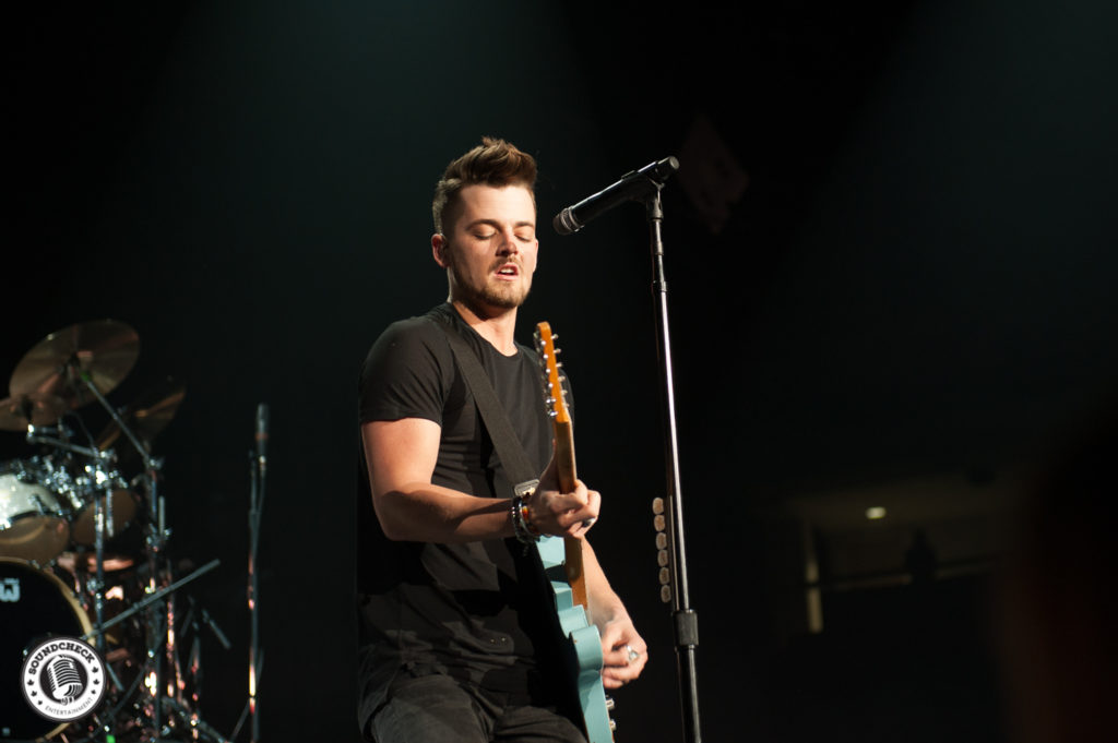 Chase Bryant performs as part of Brad Paisley's Life Amplified Tour stop in Kingston - photo by Ron Pettitt