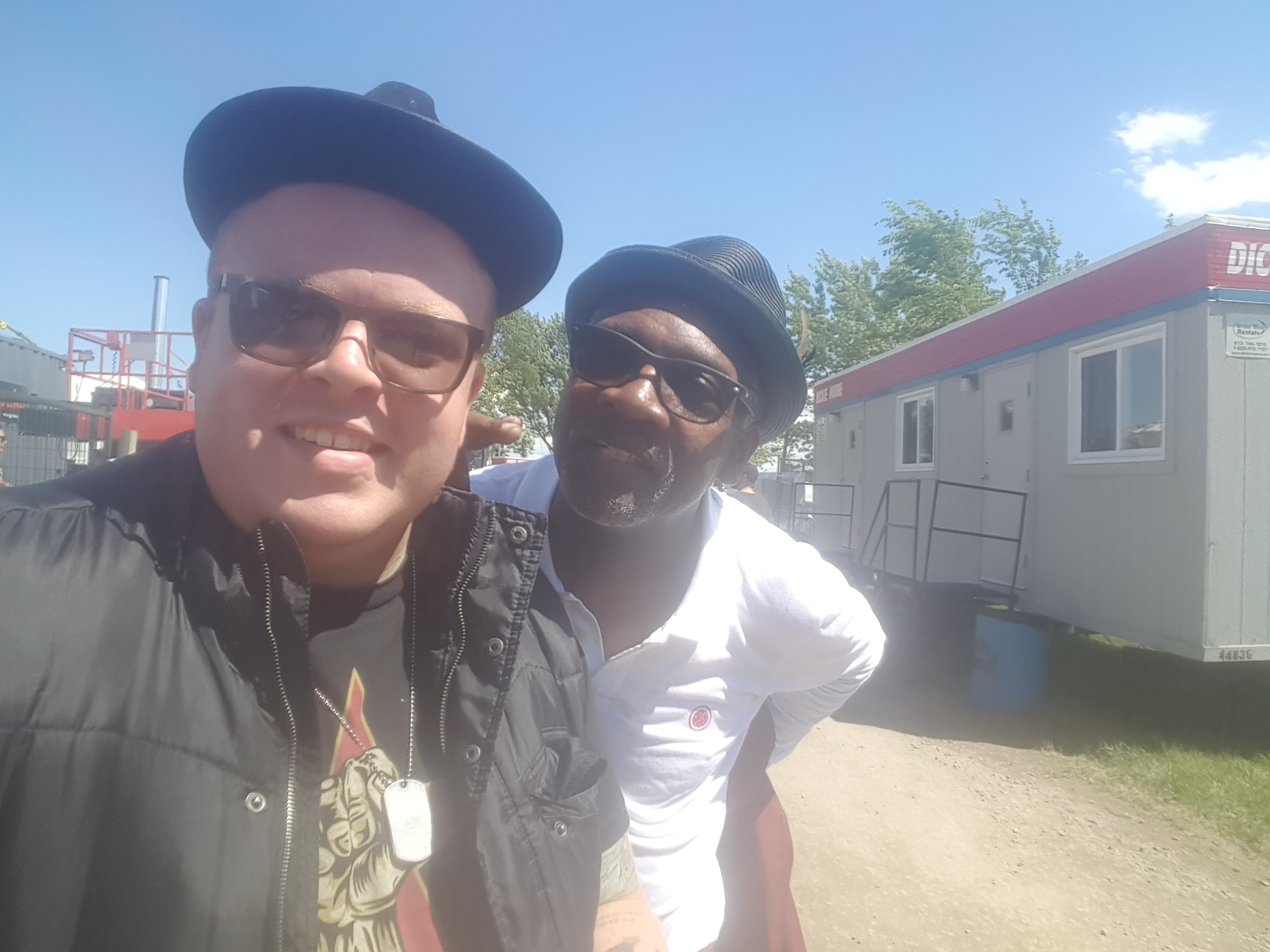Our own Leigh Bursey posing with Lynval Golding of Lynval Golding and Contra Coup, and legendary English band, The Specials.